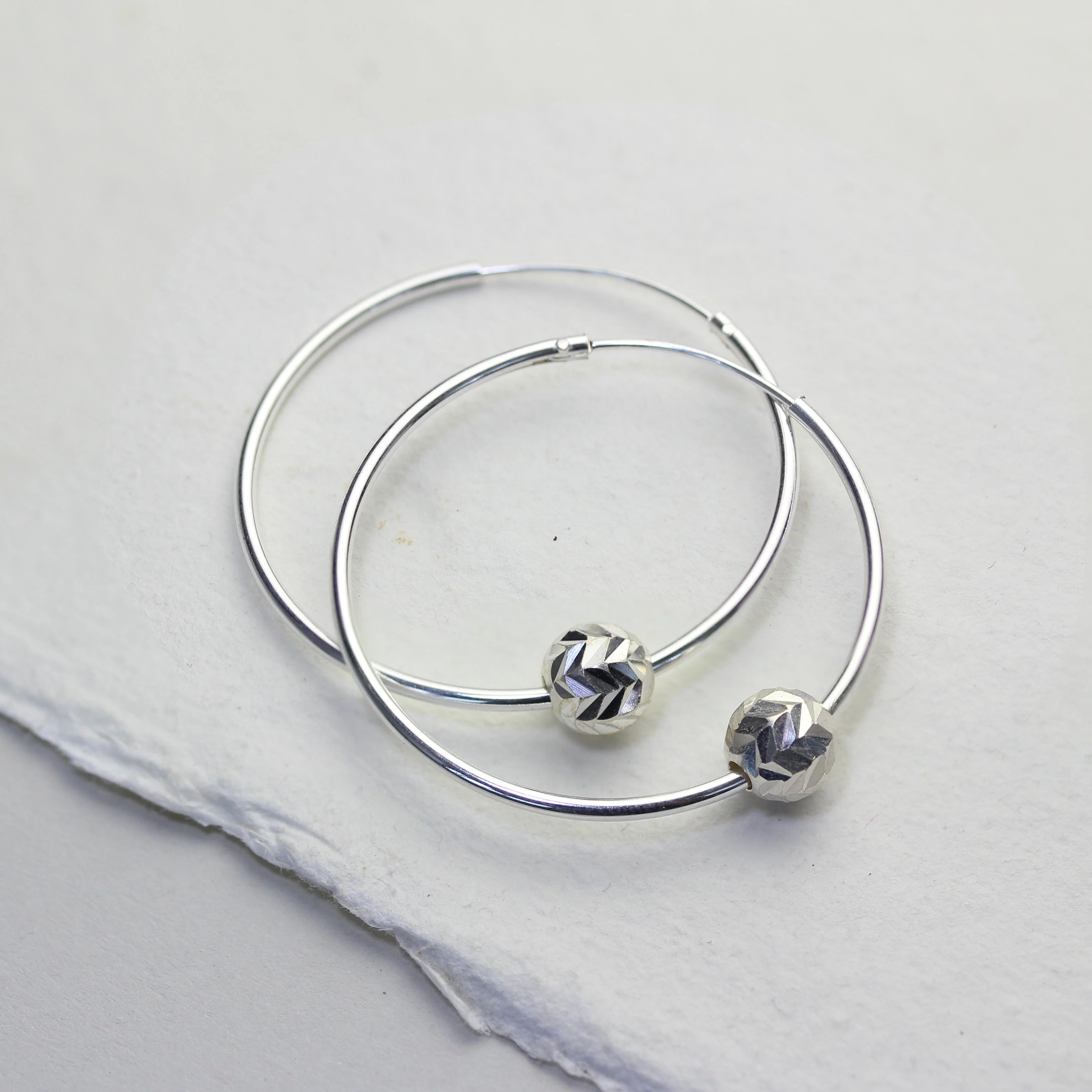 Sterling Silver 22mm Hoop Earrings with Chevron Cut Ball Beads - Image 2