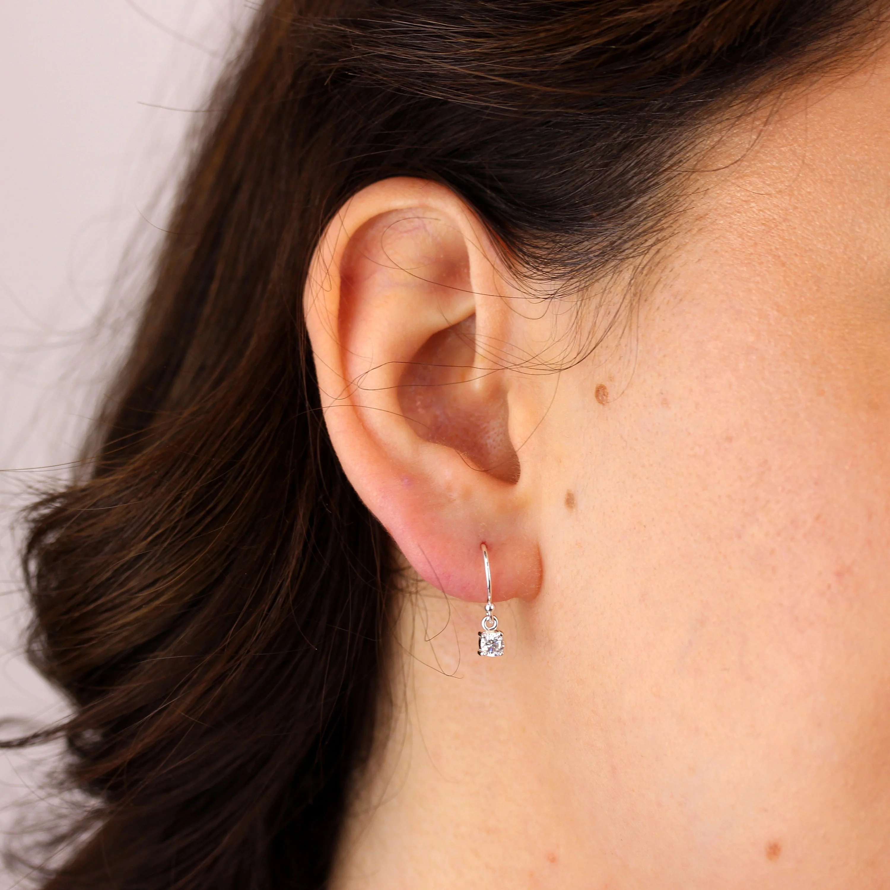 Sterling Silver Clear CZ April Birthstone Dangle Earrings - Image 2